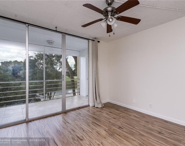 9431 Live Oak Pl - Photo Thumbnail 8