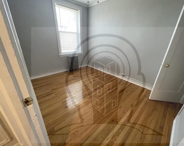 1371 W Estes Ave - Photo Thumbnail 5