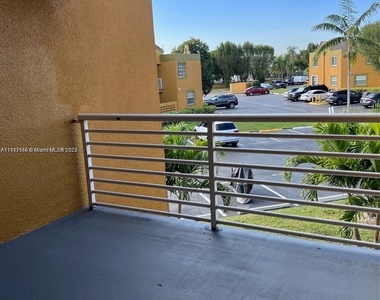 9711 Fontainebleau Blvd - Photo Thumbnail 1