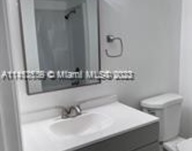 9711 Fontainebleau Blvd - Photo Thumbnail 3