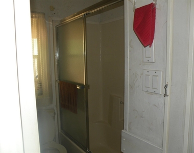 5707 E 32 St - Photo Thumbnail 5