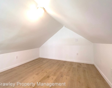 1214 S Lincoln Street - Photo Thumbnail 6