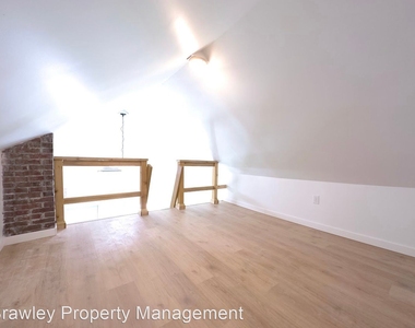 1214 S Lincoln Street - Photo Thumbnail 5