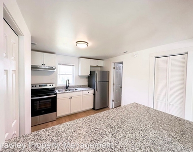 1214 S Lincoln Street - Photo Thumbnail 2