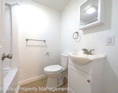 1214 S Lincoln Street - Photo Thumbnail 3