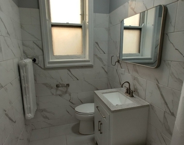 1216 W Jarvis Avenue - Photo Thumbnail 6