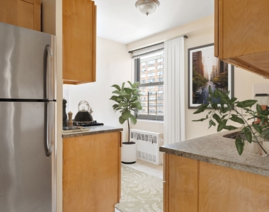 68th Dr & Booth St - Photo Thumbnail 4