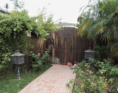 10394 Almayo Ave - Photo Thumbnail 2