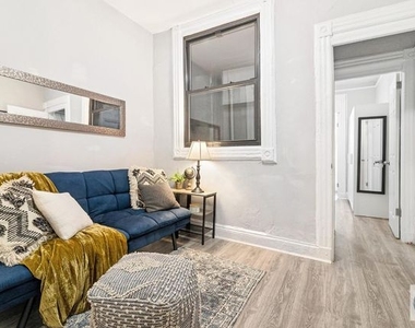W 52nd St  - Photo Thumbnail 2
