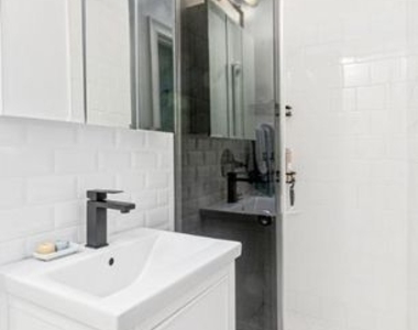 W 52nd St  - Photo Thumbnail 4