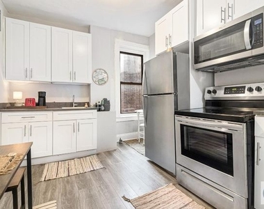 W 52nd St  - Photo Thumbnail 1