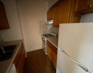 102-40 67th Road - Photo Thumbnail 3