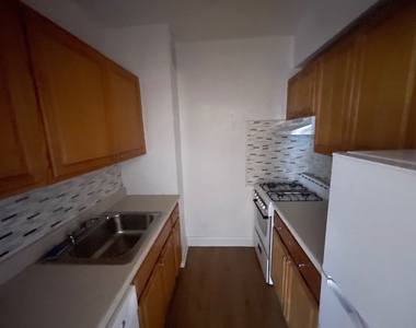 102-40 67th Road - Photo Thumbnail 1