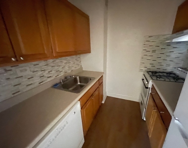 102-40 67th Road - Photo Thumbnail 2