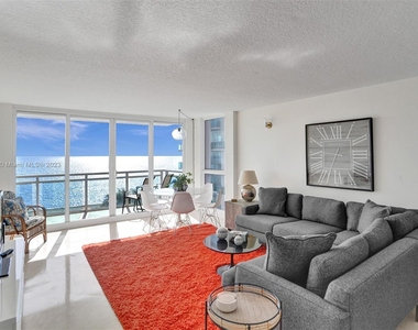 6917 Collins Ave - Photo Thumbnail 1