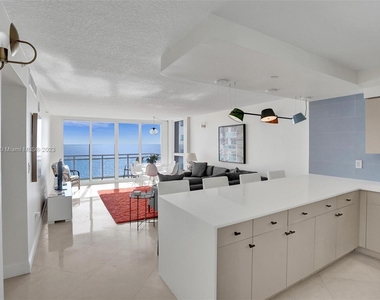 6917 Collins Ave - Photo Thumbnail 0