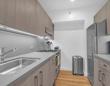 W 15th Street - Photo Thumbnail 2