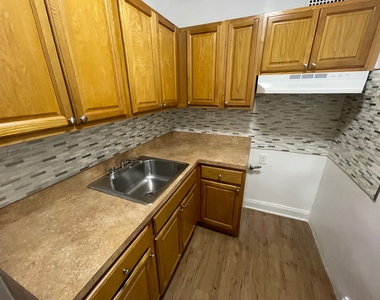 102-40 67th Road - Photo Thumbnail 2