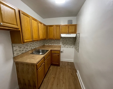 102-40 67th Road - Photo Thumbnail 1
