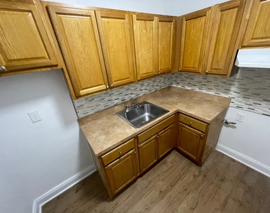 102-40 67th Road - Photo Thumbnail 3