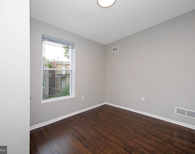 5449 Delancey St - Photo Thumbnail 12