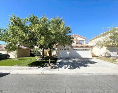 7813 Desert Bell Avenue - Photo Thumbnail 0