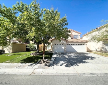 7813 Desert Bell Avenue - Photo Thumbnail 1