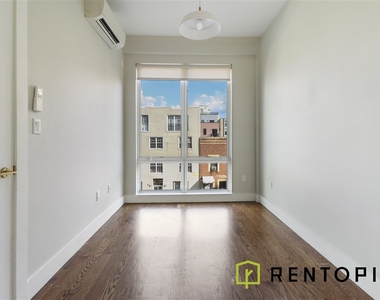 1009 Willoughby Avenue - Photo Thumbnail 2