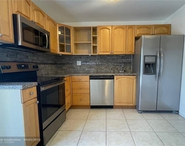 310 Sw 79th Way - Photo Thumbnail 0