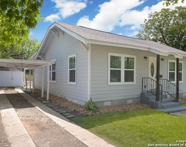 1034 W Elsmere Pl - Photo Thumbnail 2