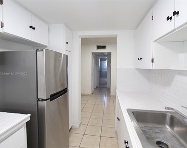 1325 W 68th St - Photo Thumbnail 7