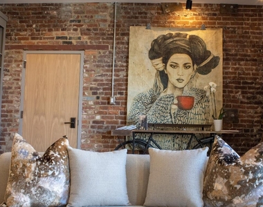 216 W 8th St - Photo Thumbnail 2