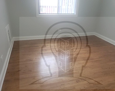 7545 N Winchester Ave - Photo Thumbnail 2