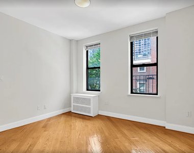 70th Street and 2nd Avenue - Photo Thumbnail 1