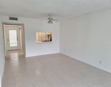 9480 Poinciana Pl - Photo Thumbnail 2