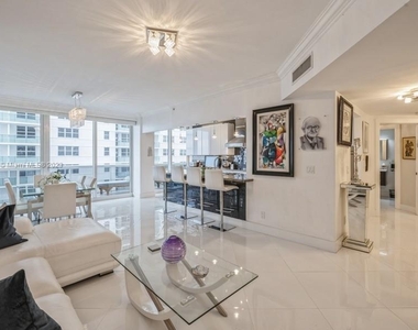 9559 Collins Ave - Photo Thumbnail 2