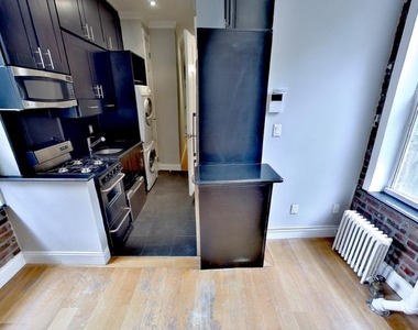 East 7th Street, Unit 1B - Photo Thumbnail 1