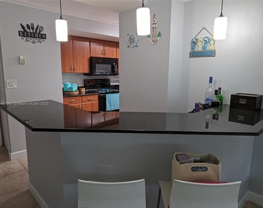 6917 Collins Ave - Photo Thumbnail 11