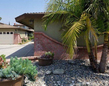 14449 Palmrose Avenue - Photo Thumbnail 0