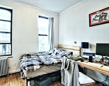 214 East 10th Street - Photo Thumbnail 0