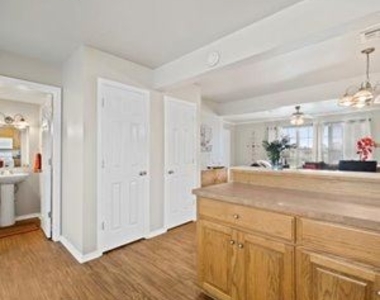 6715 S Utica Pl - Photo Thumbnail 10