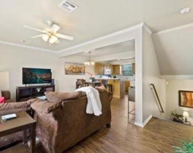 6715 S Utica Pl - Photo Thumbnail 2