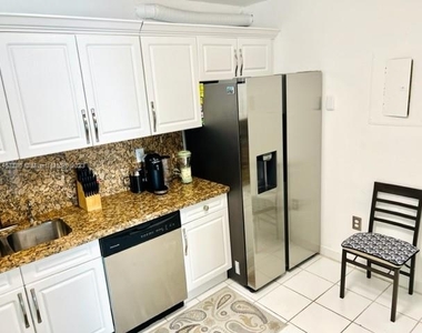 9341 Collins Ave - Photo Thumbnail 17