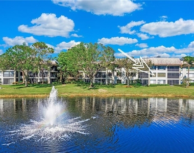 5970 Pelican Bay Blvd - Photo Thumbnail 1