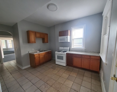 6506 S Eberhart Avenue - Photo Thumbnail 1