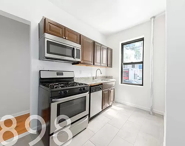 102-45 Corona Ave - Photo Thumbnail 4