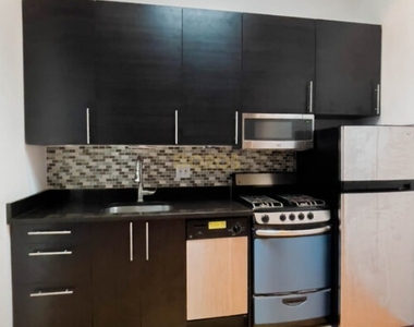 217 East 10th Street - Photo Thumbnail 3
