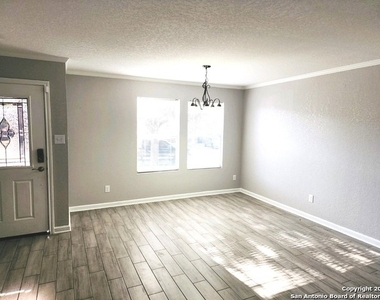 9114 Mimosa Manor - Photo Thumbnail 2