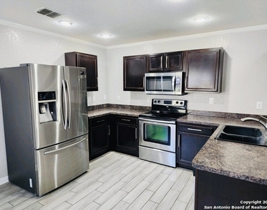 9114 Mimosa Manor - Photo Thumbnail 11