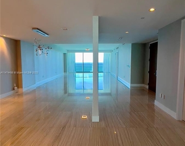 10203 Collins Ave - Photo Thumbnail 11